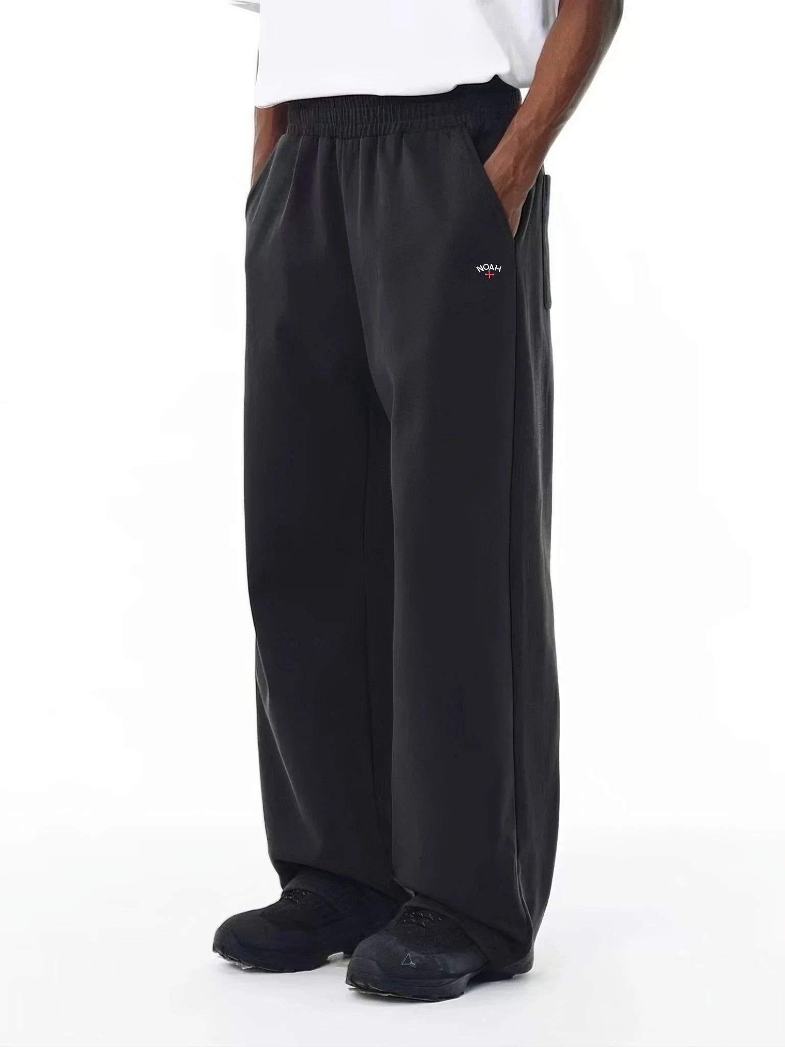 NOAH MARS Logo Embroidered Cross-Shape Micro Flared Pants